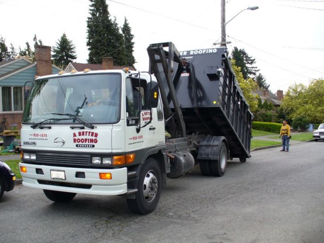 A Better Roofing Company Dumpster Trucks
