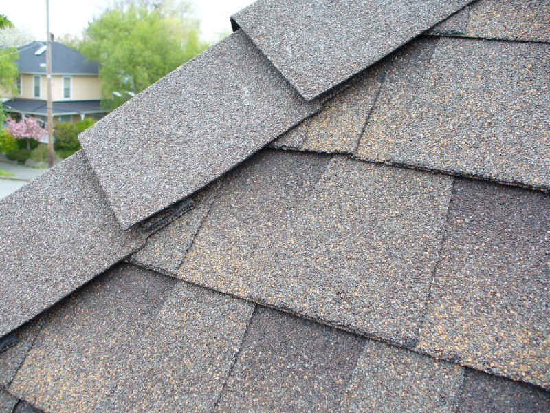 Close up of asphalt tiles at the hip and ridge