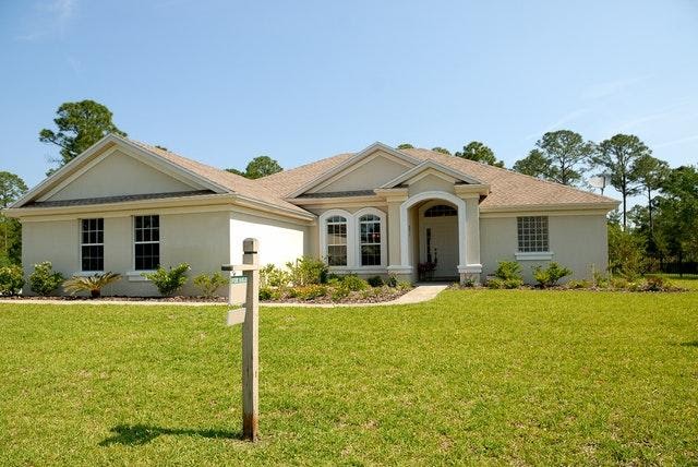 Contemporary Home With Light Colored Shingles