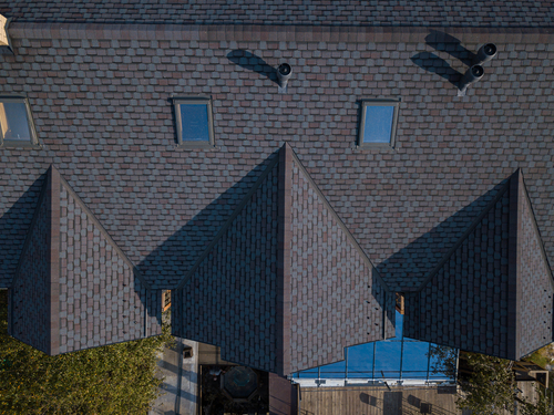 Overhead shot of dark asphalt shingles