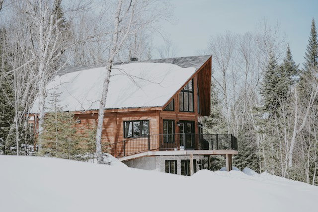 Home with snow on its roof